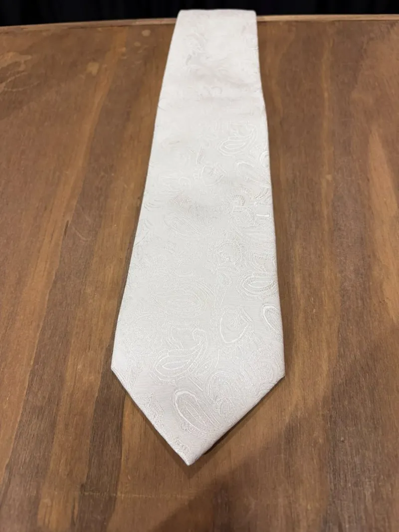 Corbata beige con diseño