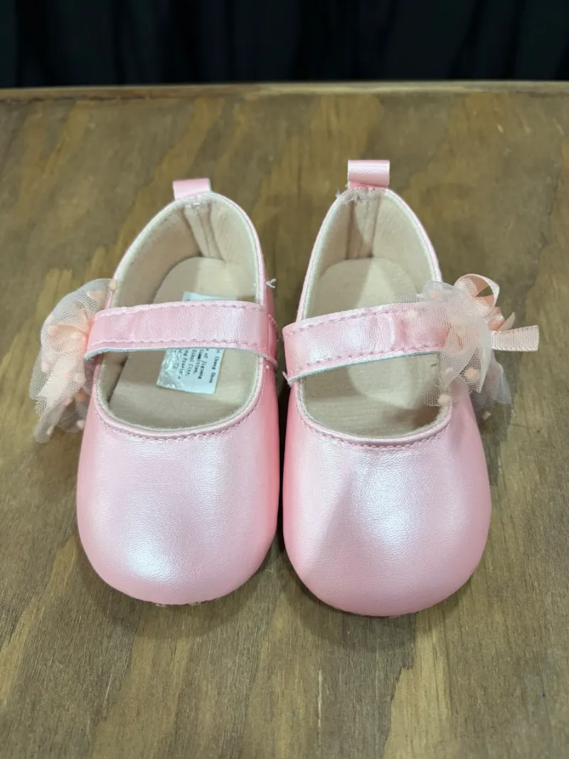 Zapatos rosas de niña